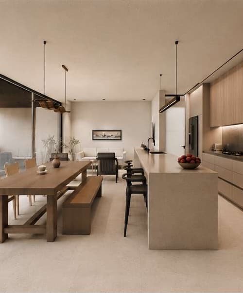 Casa Siena kitchen with light-toned finishes and a light peninsula